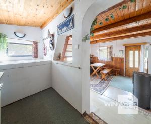 Murovaná chata neďaleko golfového klubu • obec Malá Ida