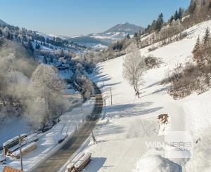 Stavebný pozemok s projektom na 5izbovú chatu a platným stavebným povolením