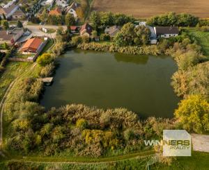 Ponúkame na predaj 4-izbový  mezonetový byt pri jazere v rodinnom dome  s parkovaním