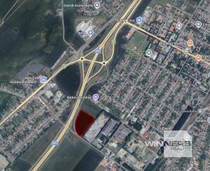 NA PREDAJ strategický komerčný pozemok priamo pri diaľnici o veľkosti 33.729 m2 v meste ENCS – ideálny pre retail park alebo iný podnikateľský zámer.