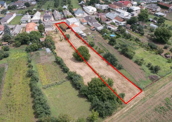 Exkluzívne na predaj stavebný pozemok o výmere 1070 m2 v obci Soľnička